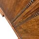 Vintage wooden display cabinet with textured glass.