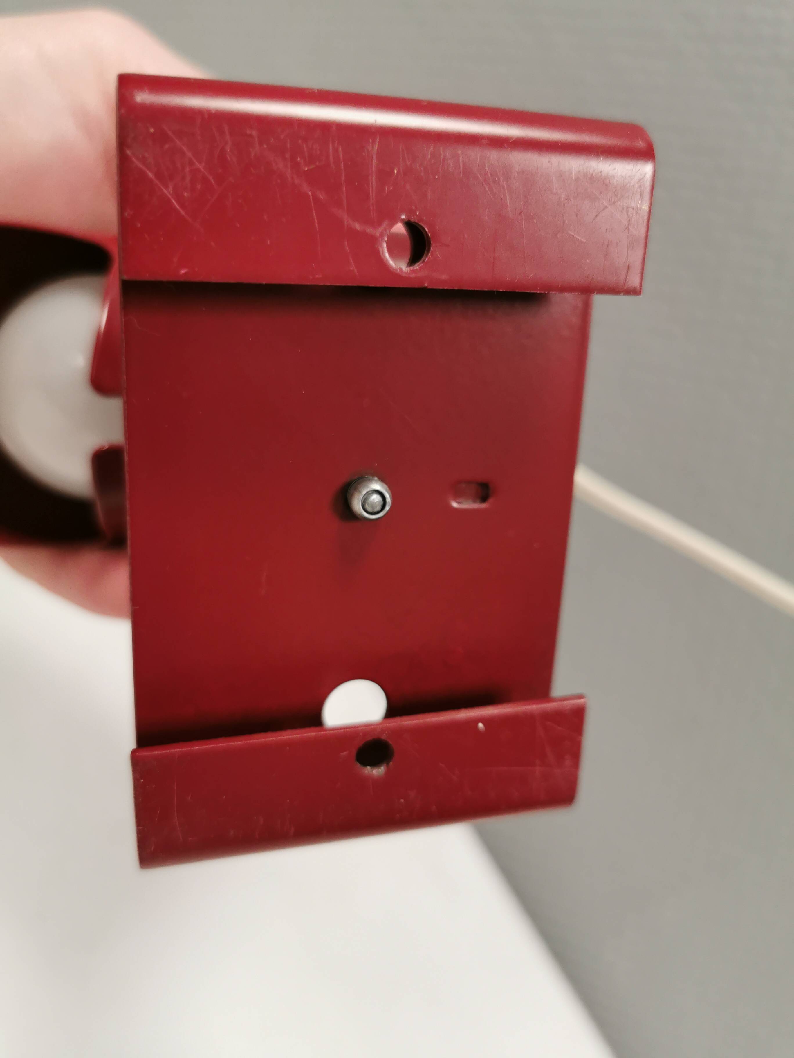 Small delicious wall lamp in Bordeaux red color from the 1980s