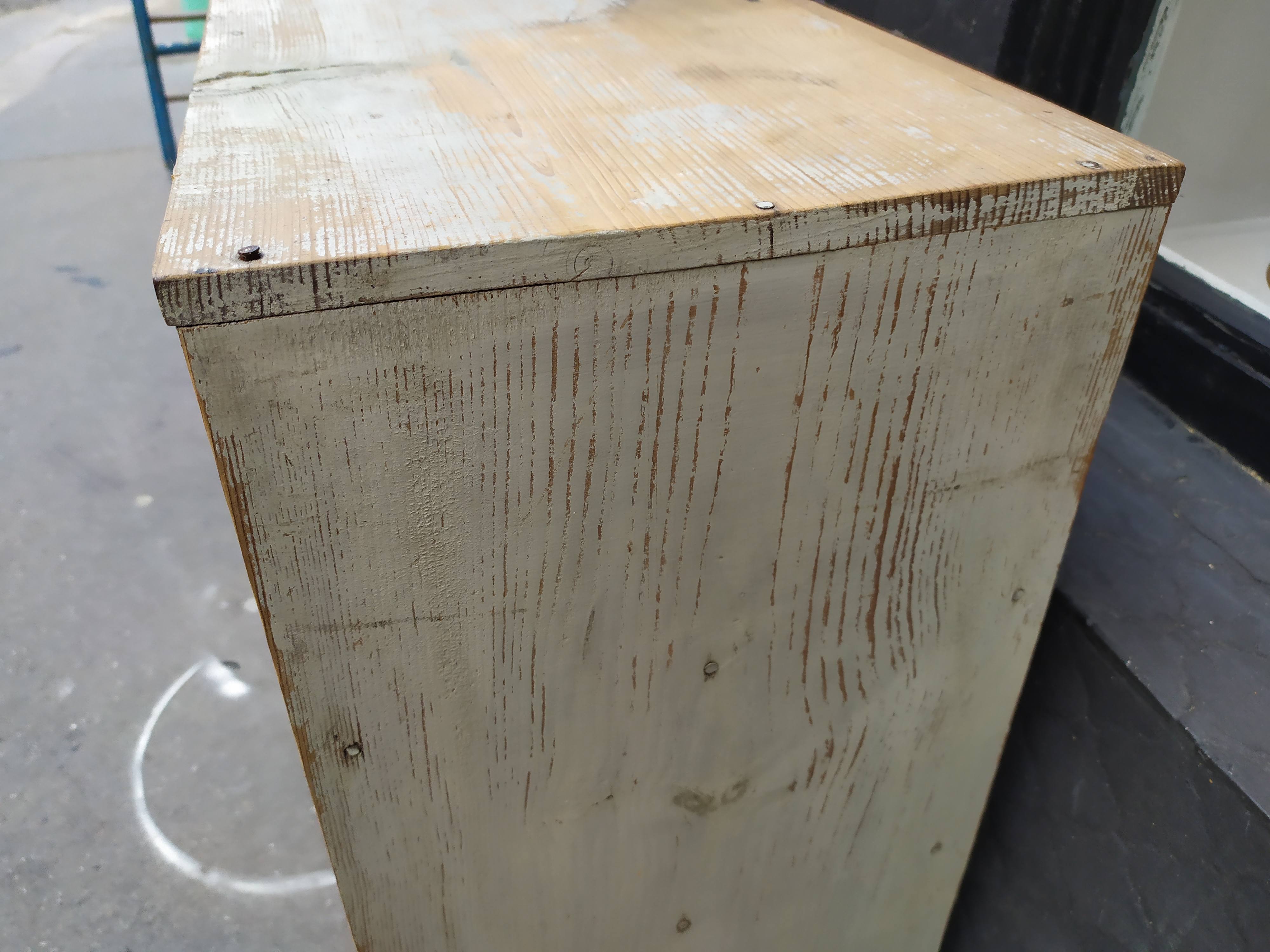 Wood-burning storage unit with an industrial locker