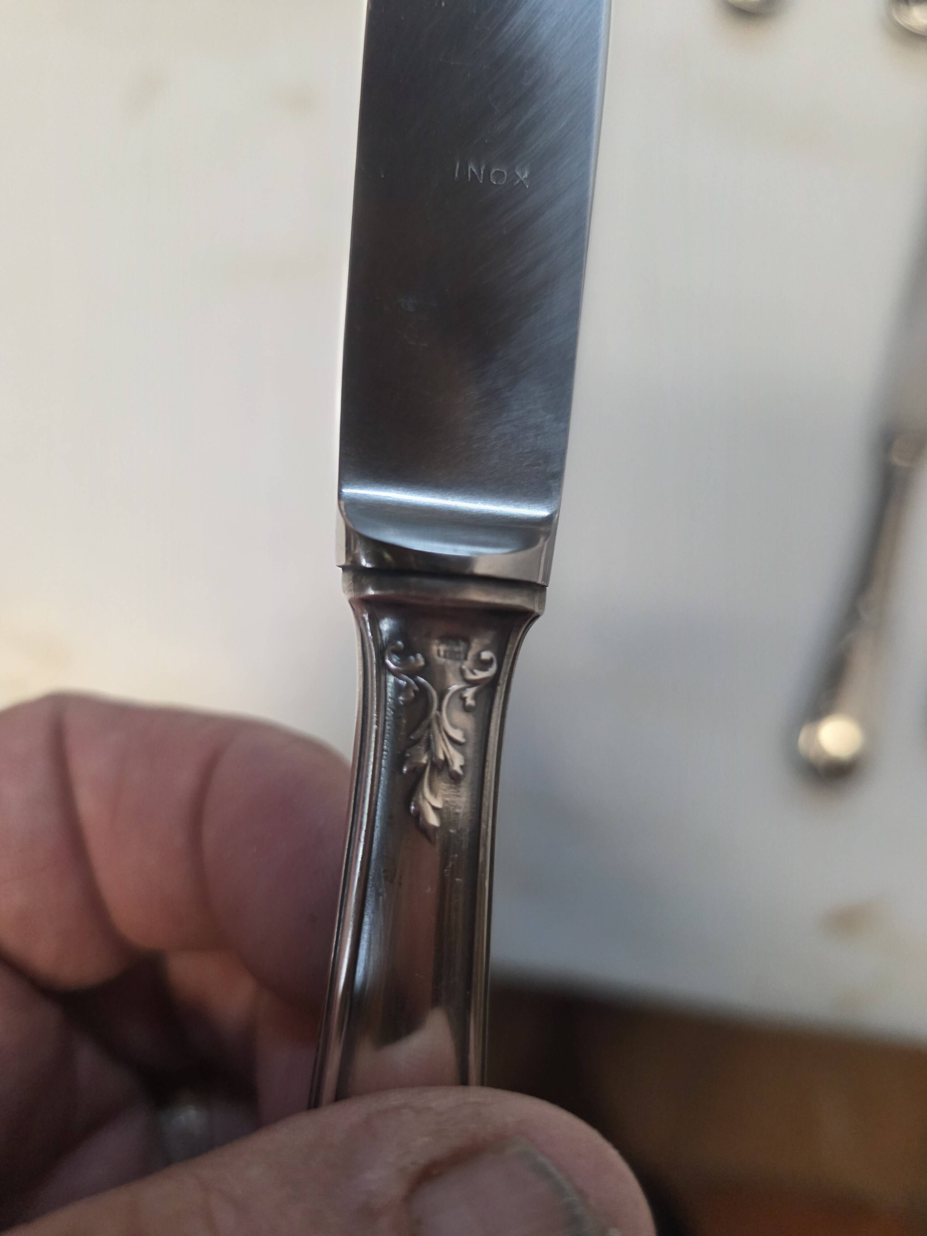 12 silver-plated knives