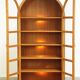 Elegant vintage Danish display cabinet with glass panels and atmospheric lighting