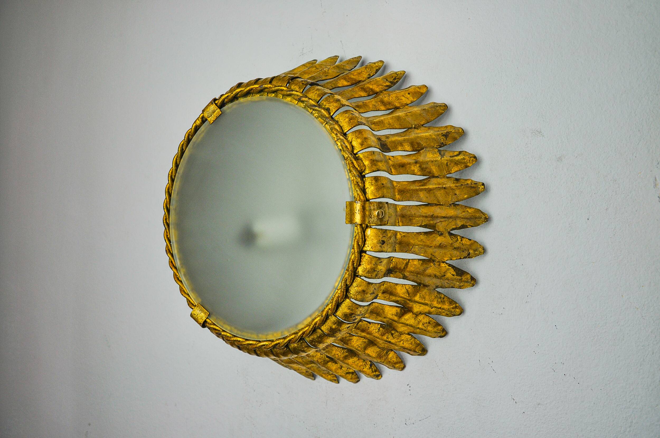 Sun wall lamp by ferro arte, metal and gold leaf, Spain, 1960