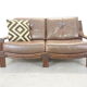 Mid century vintage boho 2-seater sofa with leather cushions