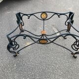 Wrought iron coffee table with glass top