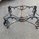 Wrought iron coffee table with glass top