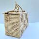 Valise vintage en fibres naturelles