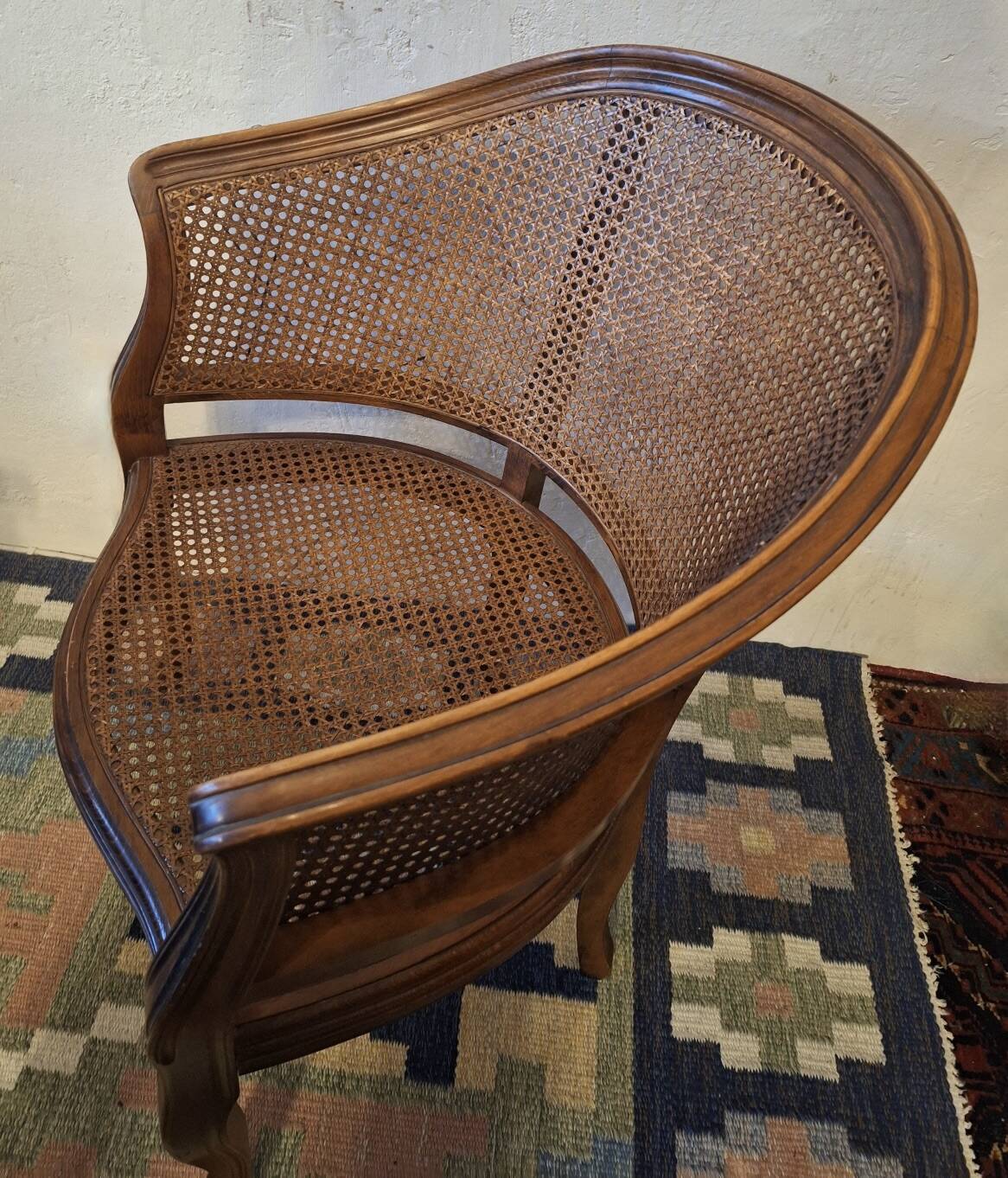 Half-moon rattan and hardwood armchair, early 20th century