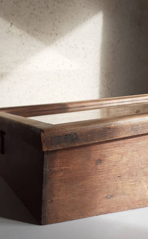 Old sloping pine display case