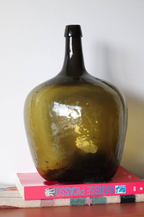 Dame jeanne ancienne en verre martelé