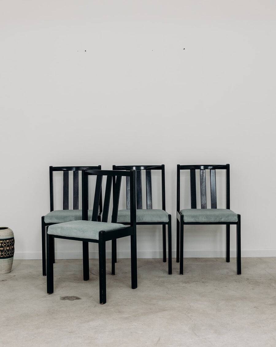 Set of 4 modernist black chairs with light blue ribbed fabric