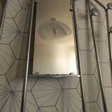 Vintage aluminum wall coat rack.