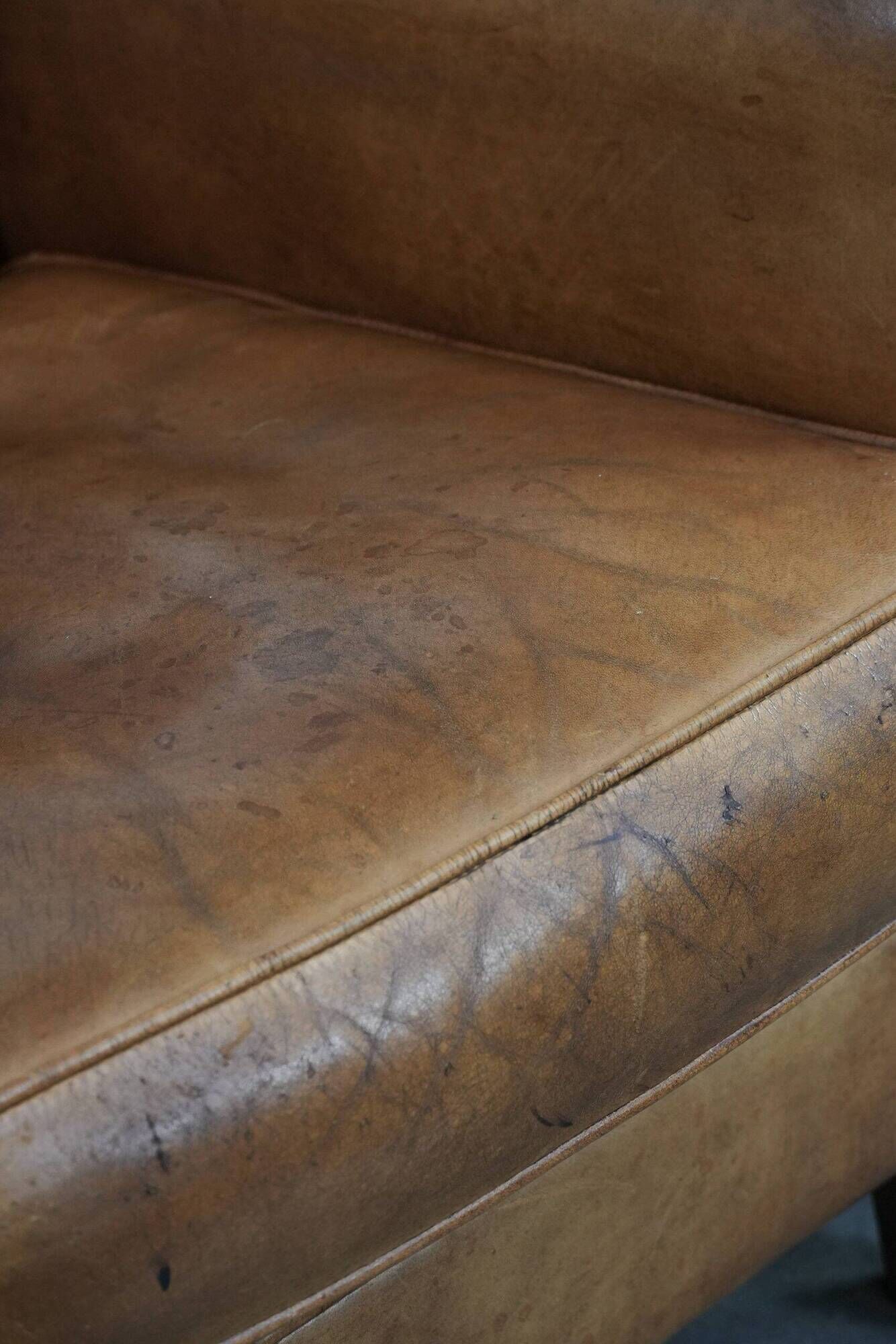 Set of two vintage sheepskin armchairs with beautiful and warm colours