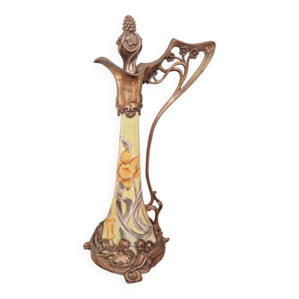 Art Nouveau style ewer in enamelled earthenware and bronze