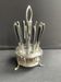 12 "Apollonox" fruit knives on silver metal support