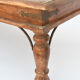 Coffee table in natural wood and wrought iron