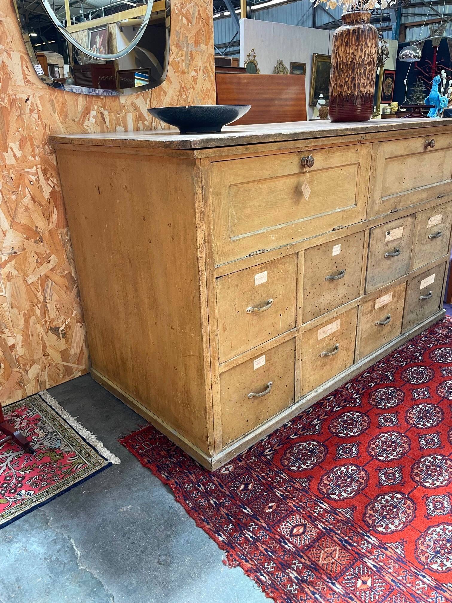 Old workshop furniture in good condition. 8 drawers and 2 drop-down doors, very