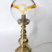 Table lamp in solid brass with a vintage 1970s glass globe.