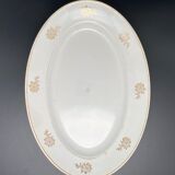 Oval serving dish with flower pattern and silver border