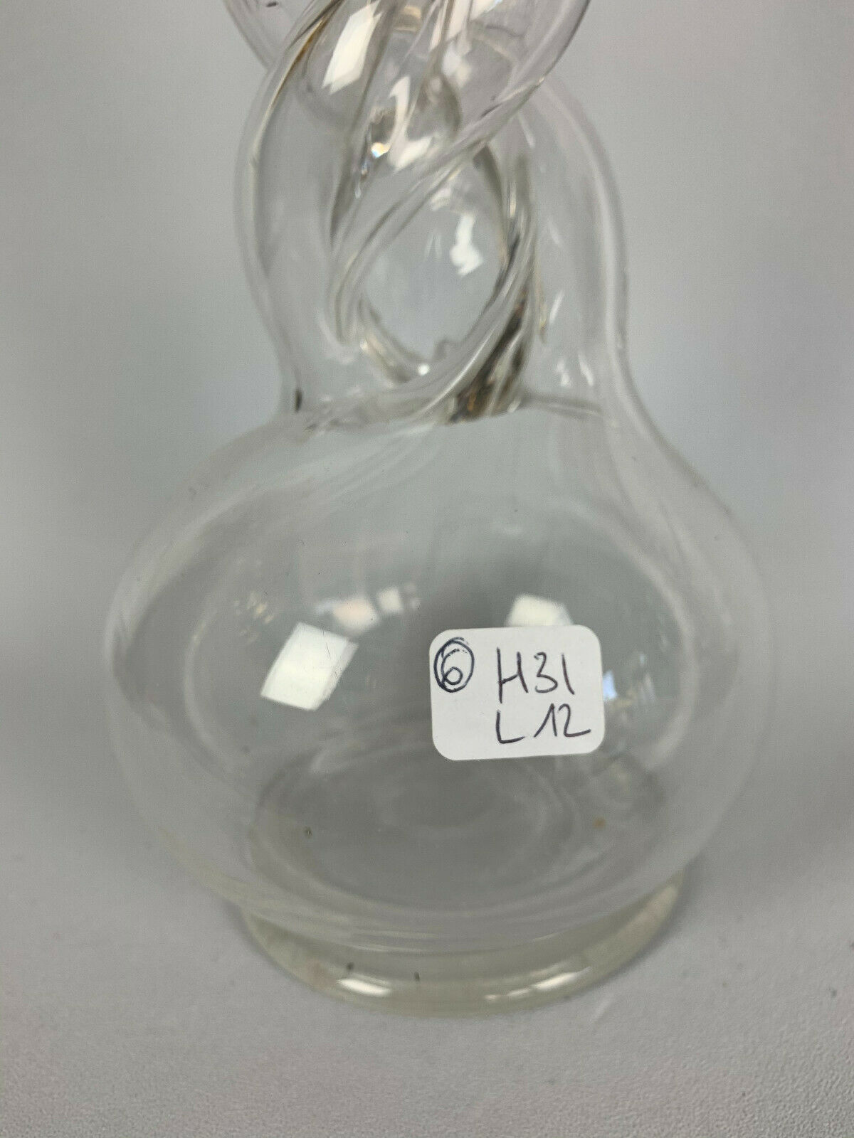 Blown glass carafe with silver frame
