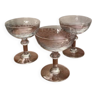 Set of 3 Art Deco engraved champagne glasses with arabesque design.