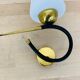 Pair of Arlus 50s opaline black and golden brass wall lamps