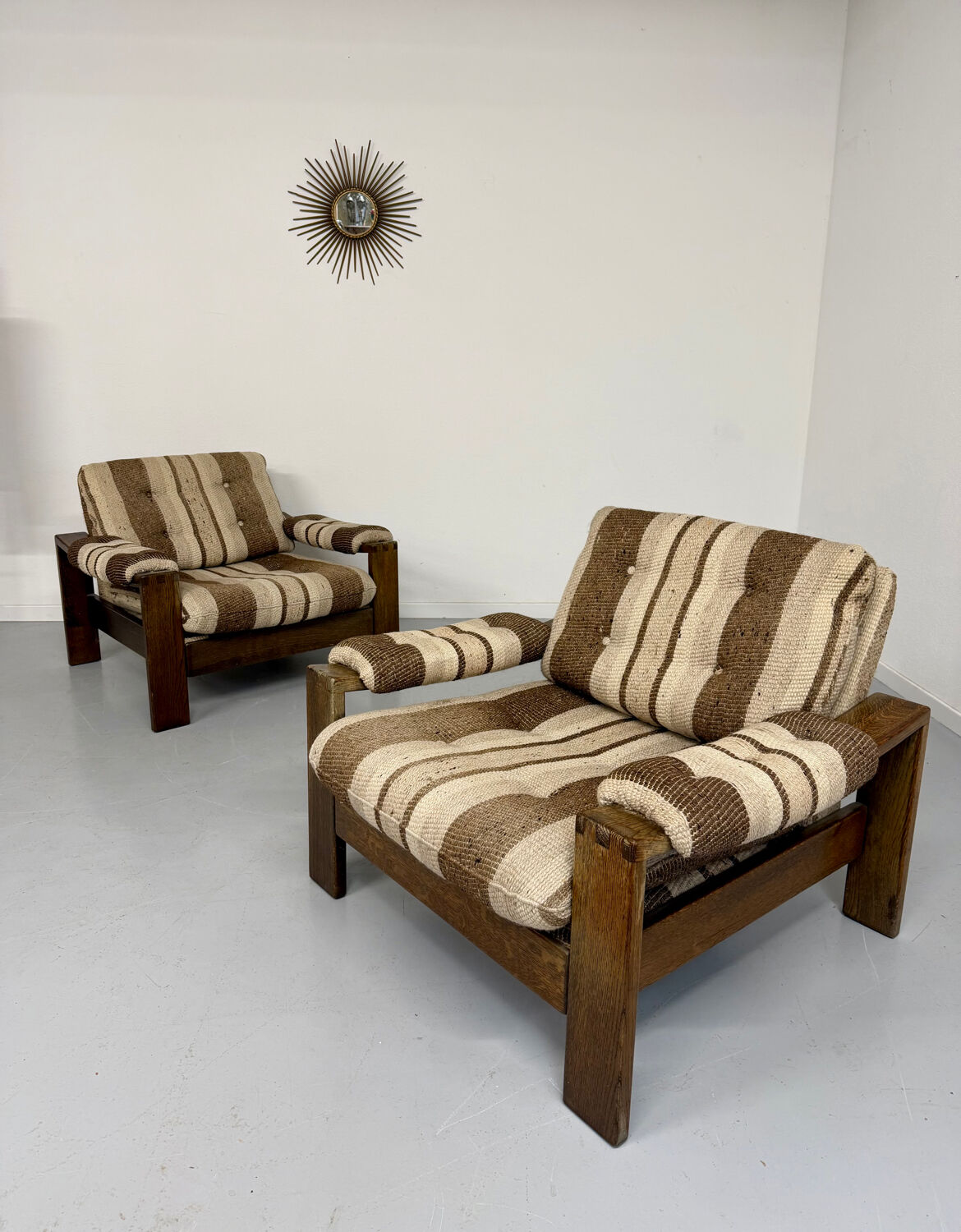 2 vintage 1970s wooden and fabric armchairs