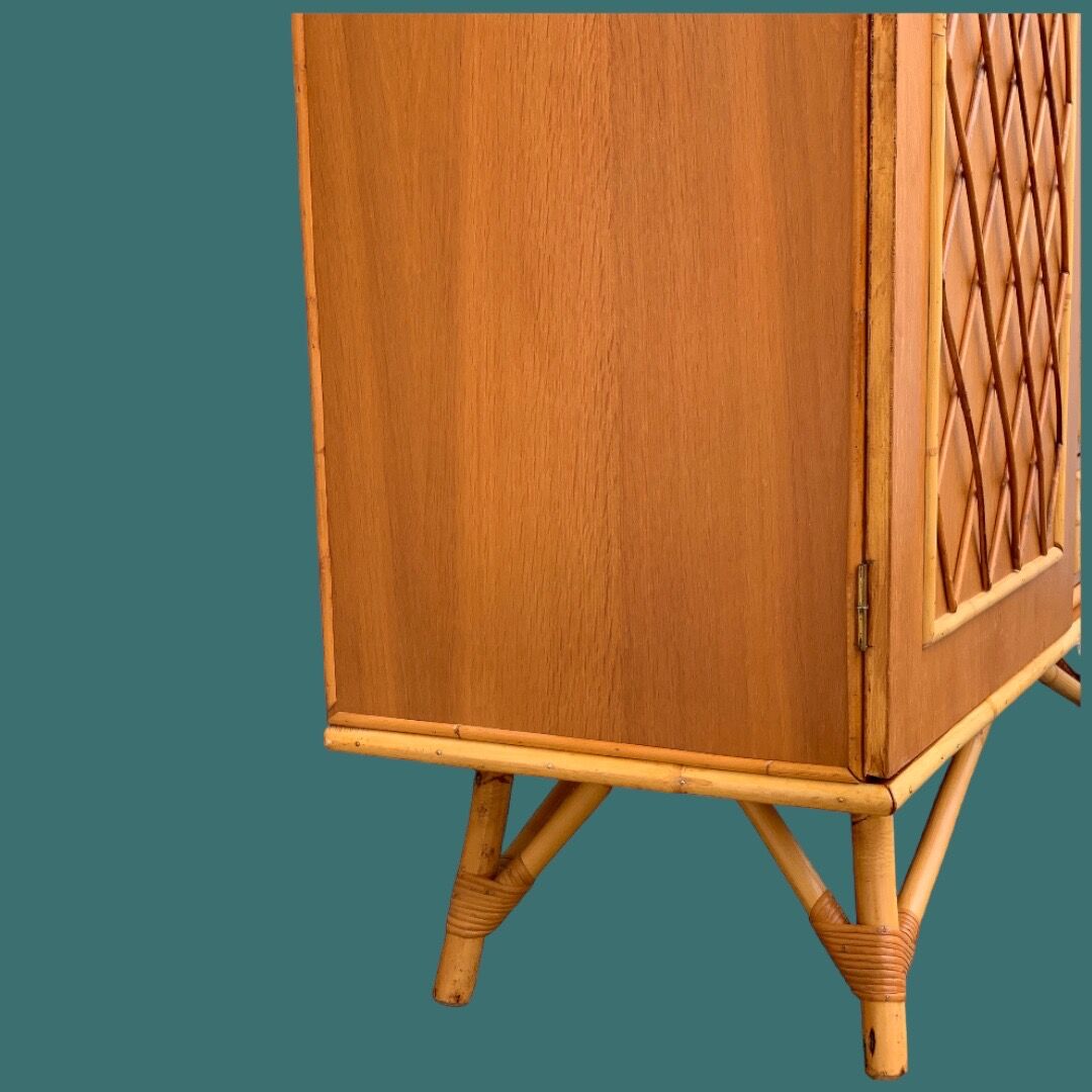 Rattan wardrobe with tapered legs from the 1960s.