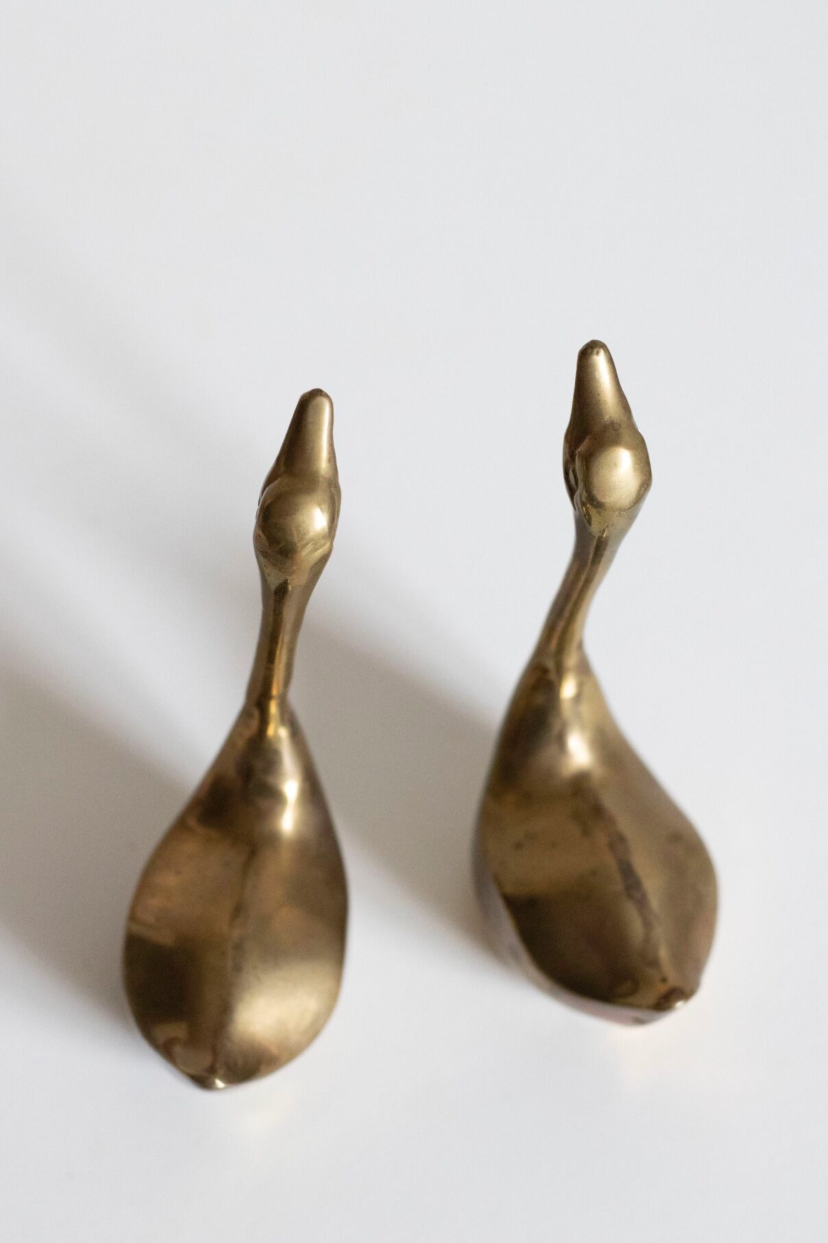 Pair of vintage brass swans