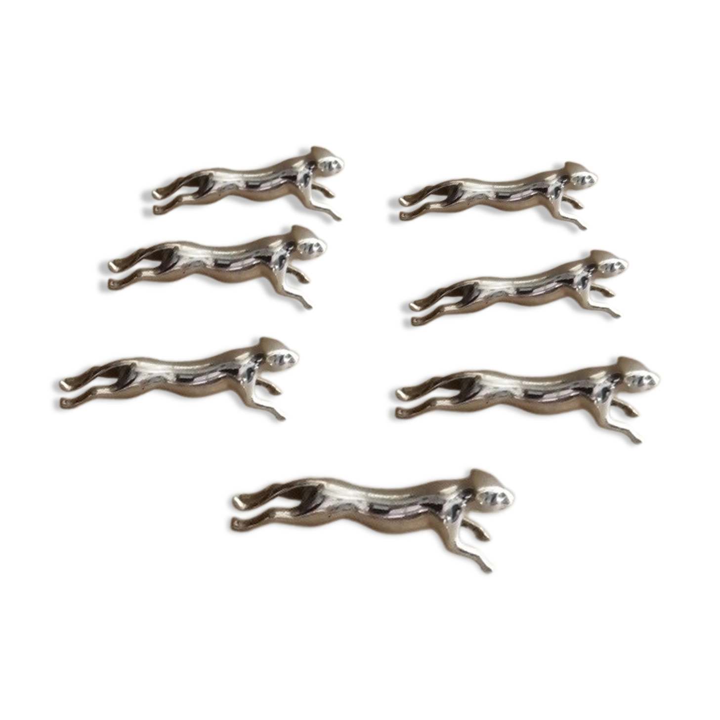 7 silver metal knife holders