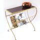 Brass magazine rack with shelf