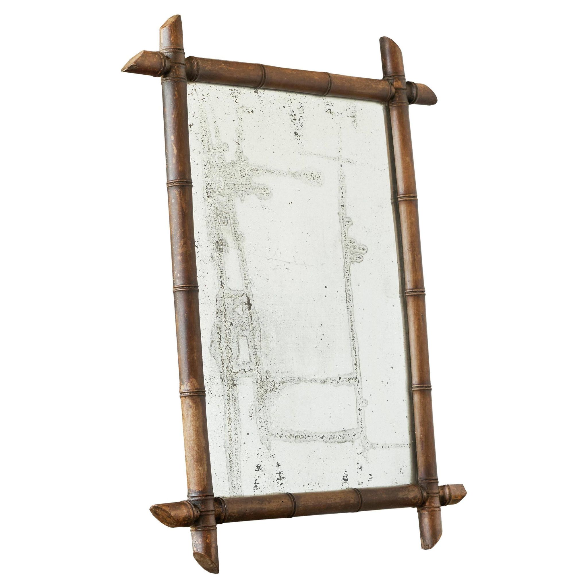 Large faux bamboo mirror in solid wood and patinated mirror, early 20th century.