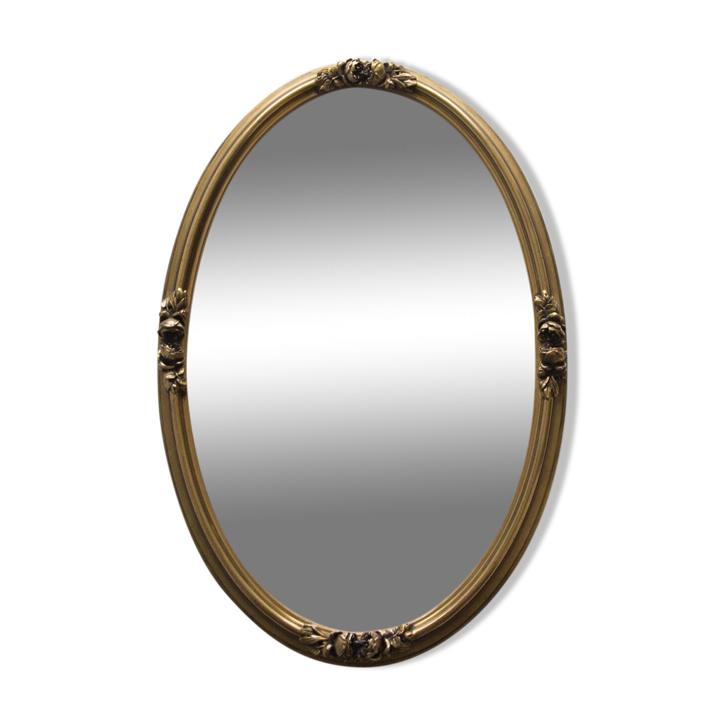 Golden oval mirror