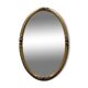 Golden oval mirror