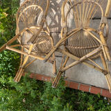 Round table with 2 rattan chairs