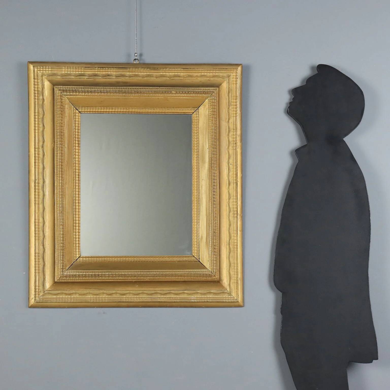 Antique gilded wooden mirror with guilloché frame, Italy, 19th century.
