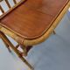 Side table with vintage rattan and wood magazine rack from the 60s