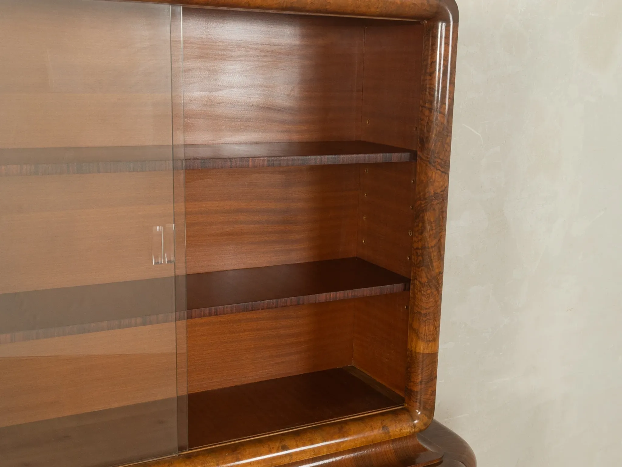 Classic two-piece Art Deco display cabinet from the 1930s with striking burl wood veneer