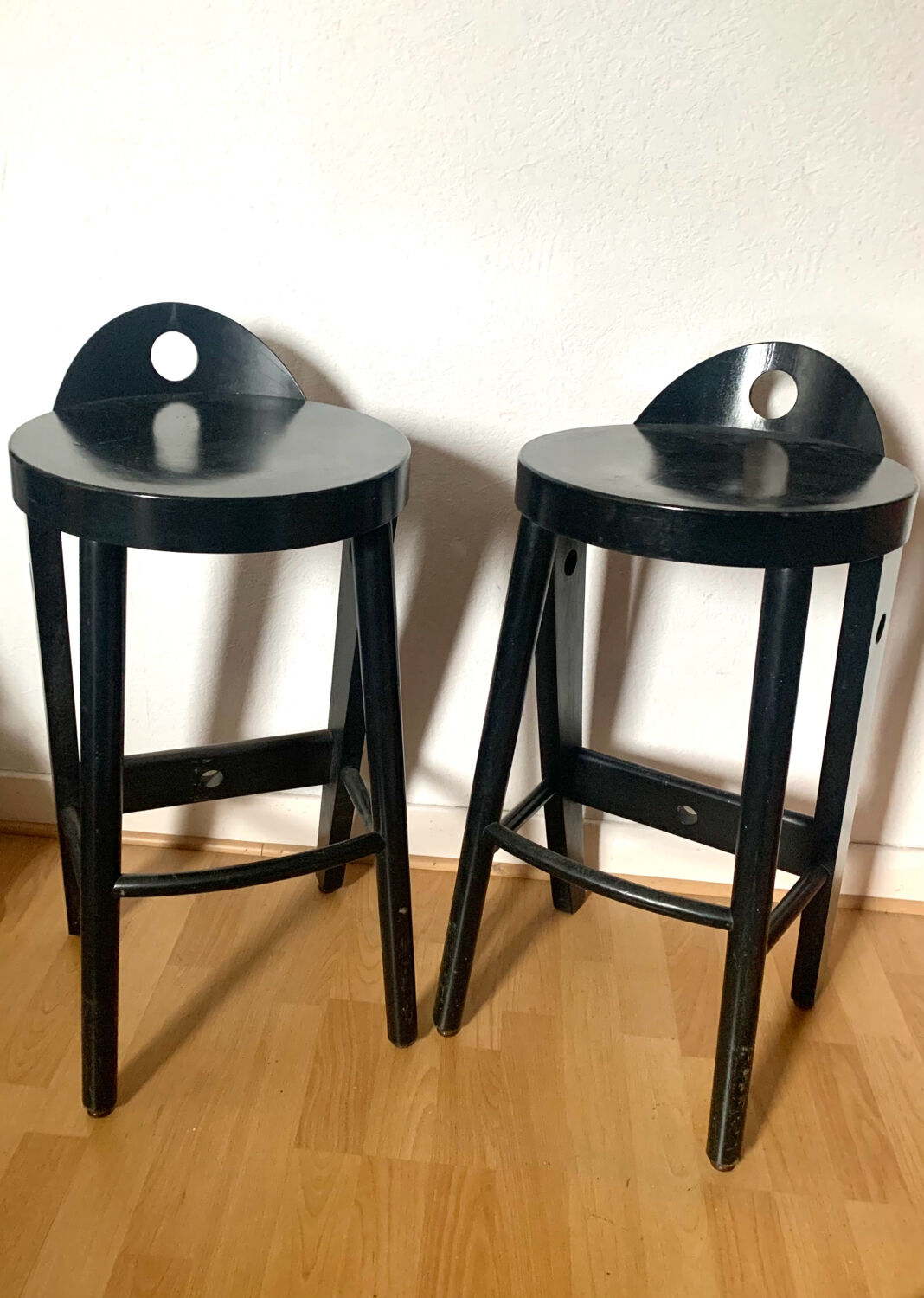 Pair of black designer stools by Baumann