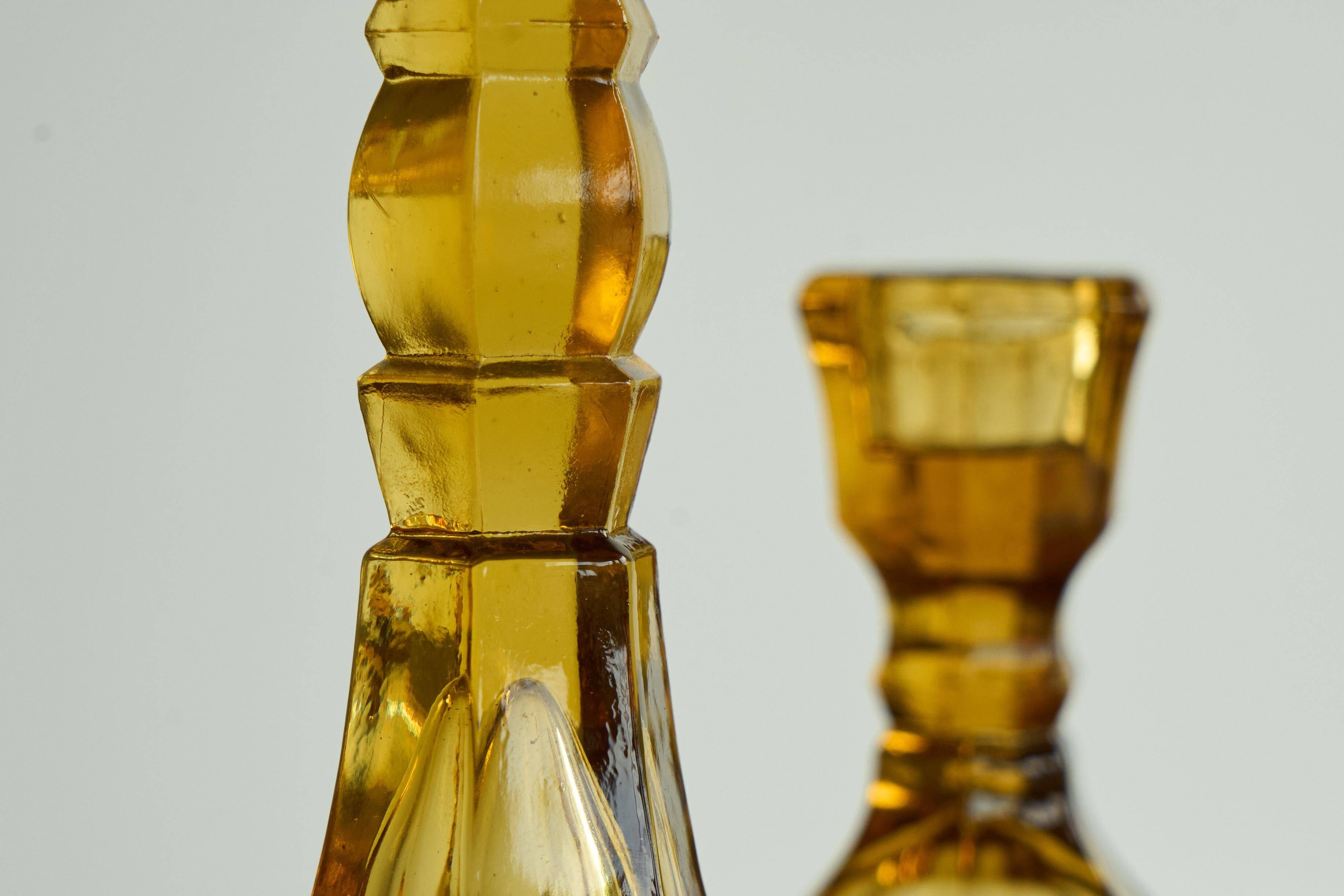 Pair of Art Deco candlesticks in pressed glass from the 1930s.