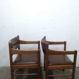 2 chaises en bois de cuir