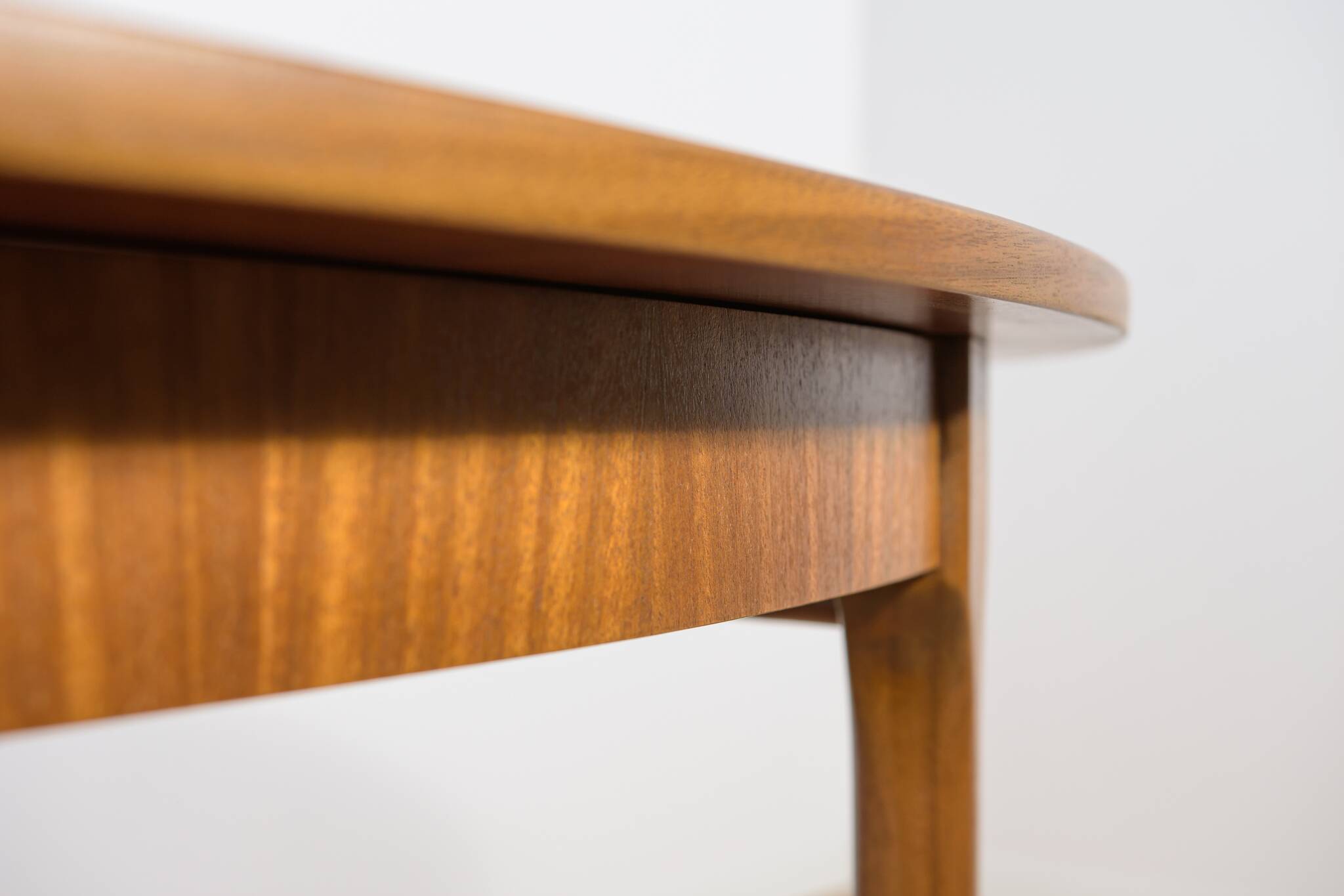 Mid-century extendable oval teak dining table from McIntosh, UK