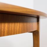 Mid-century extendable oval teak dining table from McIntosh, UK