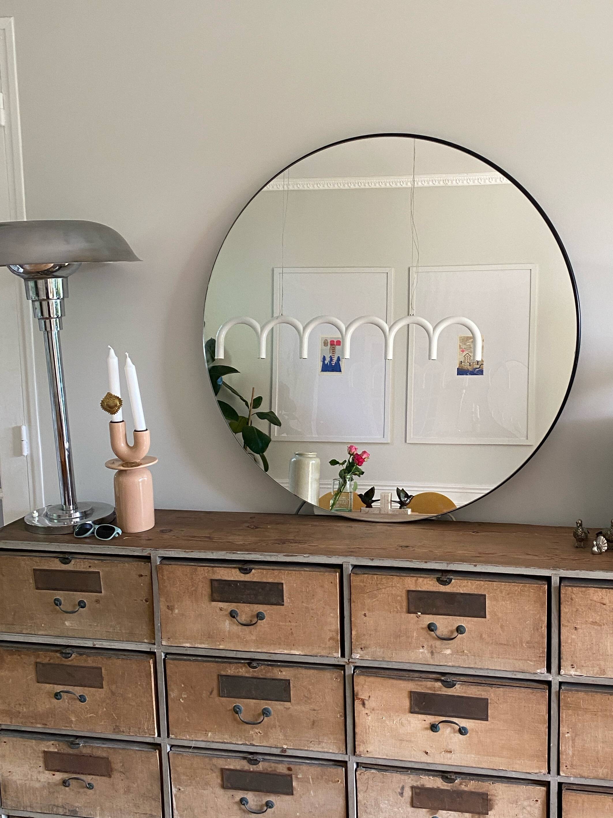 Round mirror, diameter 90 cm, mounted on MDF panel, black tinted frame