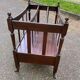 Vintage 19th-century Canterbury magazine rack made of solid wood.