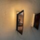 Pair of French wall lights with geometric design in copper, 1960, France.