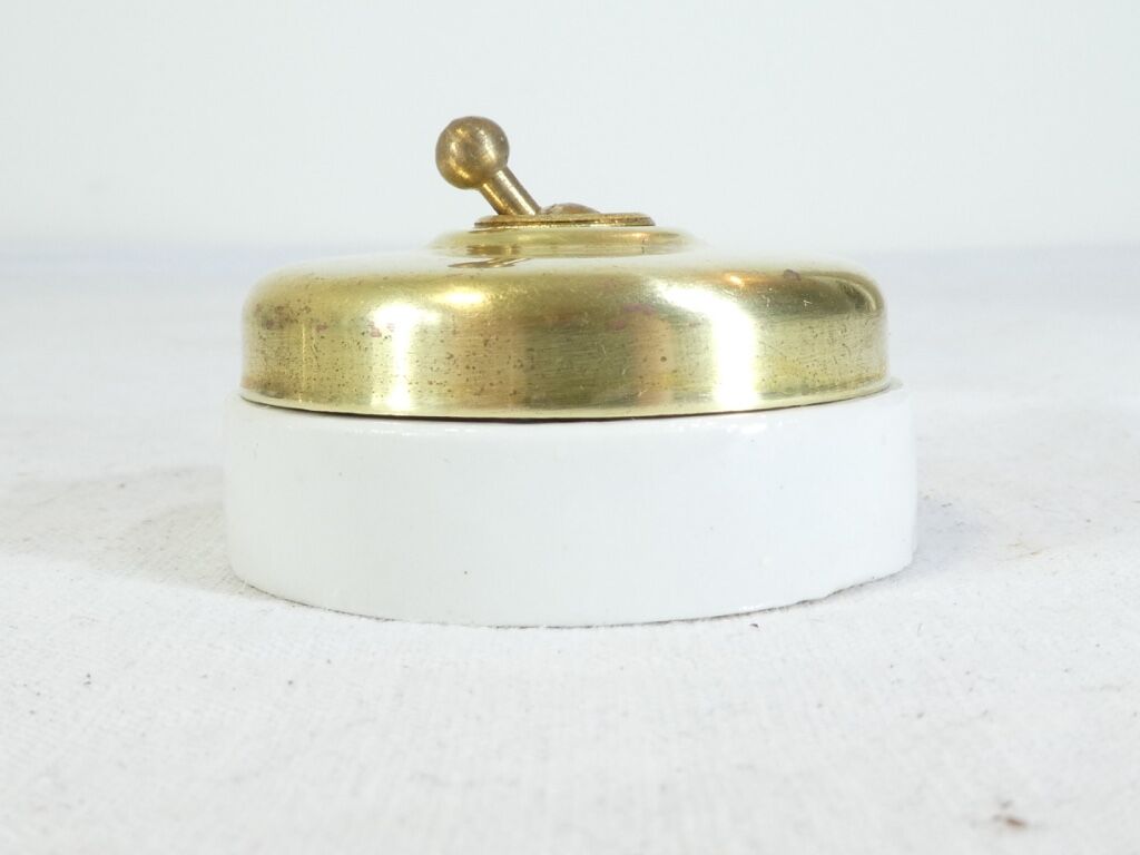 3 Old Porcelain switches and vintage industrial brass