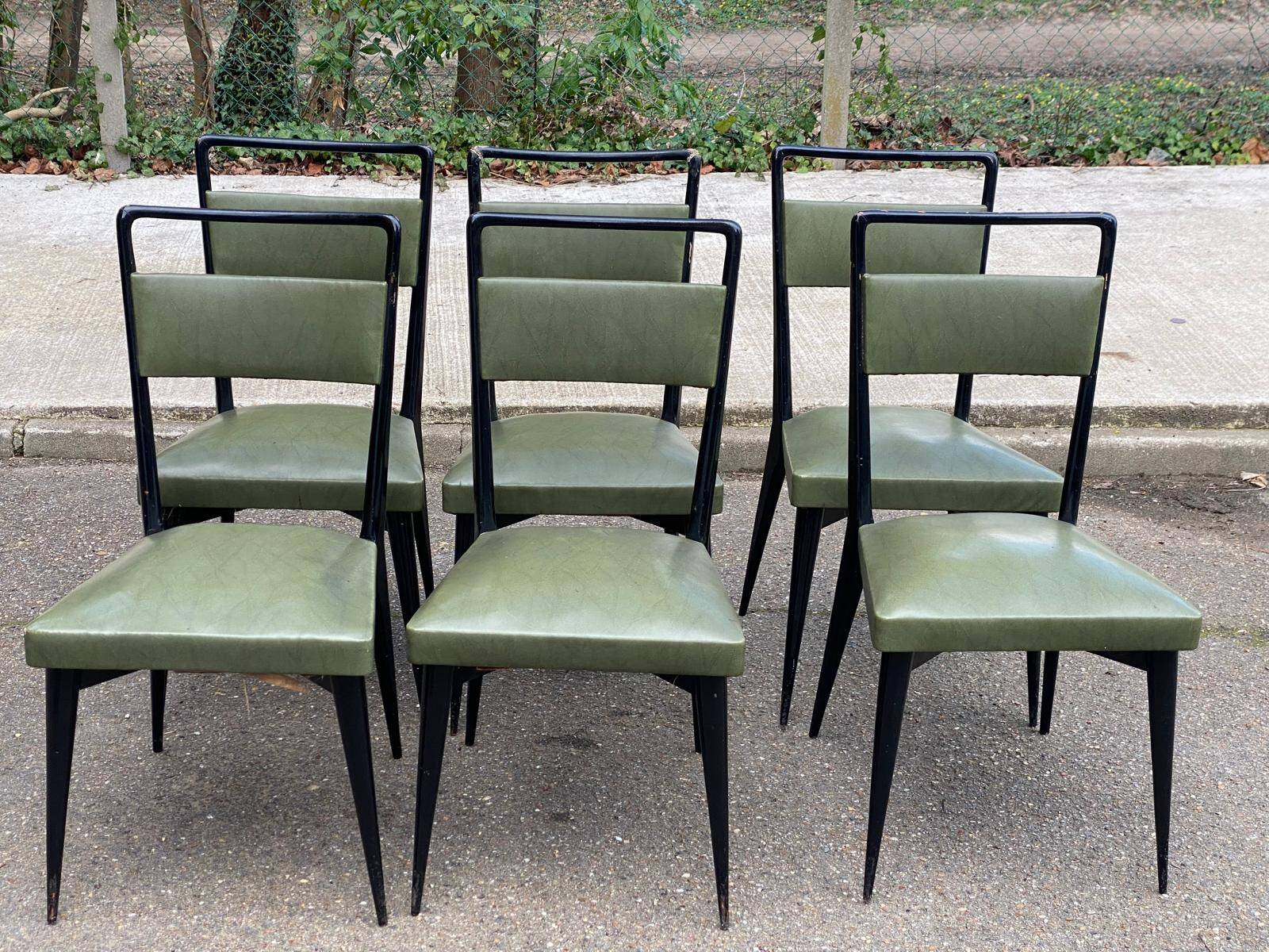 6 Italian design dining chairs in Scandinavian style with wood and olive green leather.