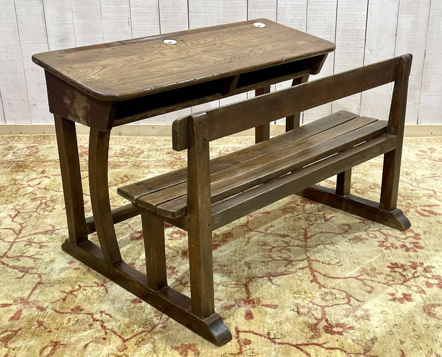 Early 20th-century oak school desk with porcelain inkwells