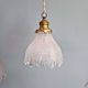 Trio of Art Deco scalloped clear glass pendant lights, 1920-30