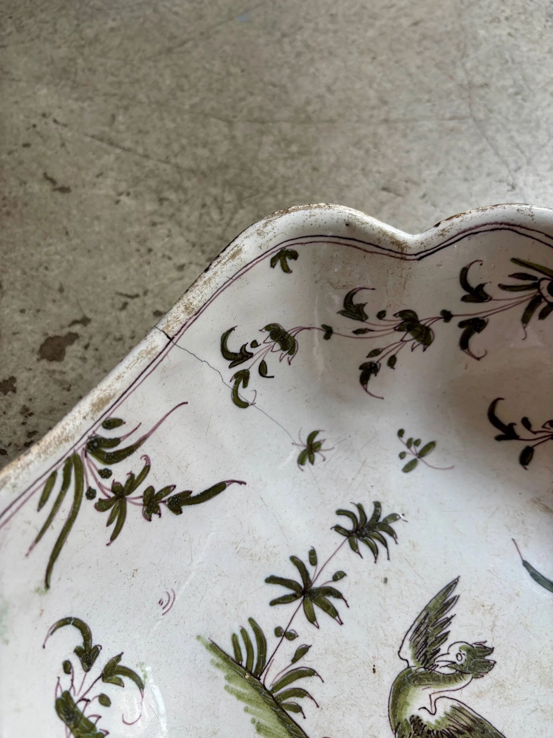 Moustiers salad bowl in cream and green earthenware, 18th century.